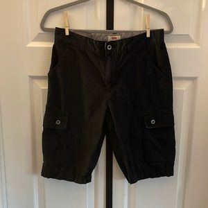 Boys black Denizen Levi’s shorts.